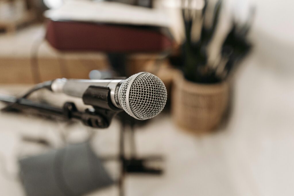 pexels photo 7802306 7802306 Close-up of a microphone in a studio setting, ready for sound recording.